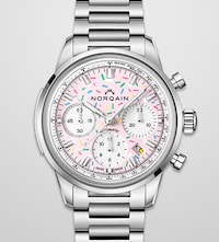 Stainless stell Norqain watch with baby pink dial. Tap to shop new Norqain arrivals image