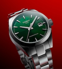 Tissot Gentleman with green dial on red background. Tap to shop new arrivals image