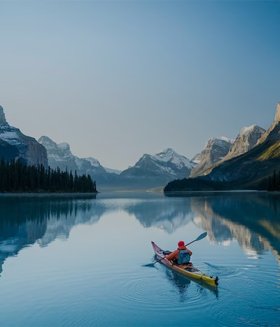 Image of Gallet explorer canoeing in mountains. image
