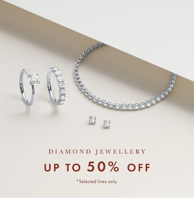 Image of diamond bracelet, earrings and ring on cream background. Up to 50% off diamond jewellery. Selected lines only, image