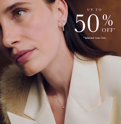 Image of female model wearing diamond jewellery - up to 50% off selected lines - shop now image