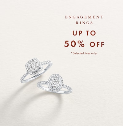 Image of engagement ring on cream background. Up to 50% off engagement rings. Selected lines only, image