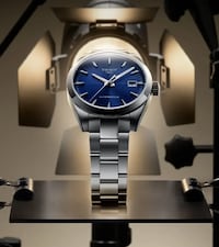 Tissot watch on mechanical background. Tap to shop classic watches image