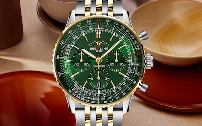 Image of Breitling Navitimer on terracotta background - Tap to shop all watches image