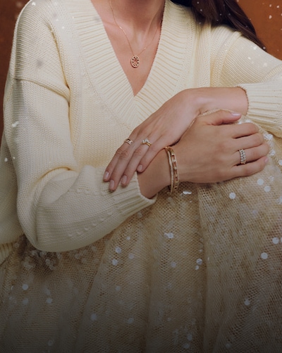 image of female model wearing jewellery - tap to shop all christmas gifts image