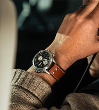 Image of a man wearing Hamilton watch. image