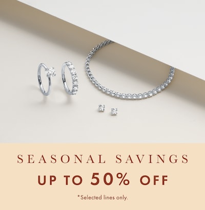 Image of diamond bracelet, earrings and rings on cream background. tap to shop all seasonal savings at up 50% off on selected lines image