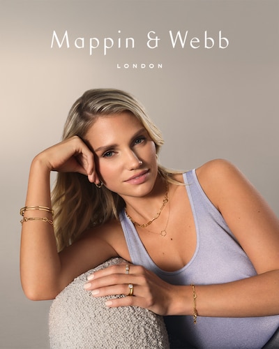 Mappin & Webb London - model wearing grey top and mappin and webb jewellery image