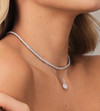 Mappin & Webb London - model wearing mappin and webb diamond necklaces image