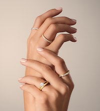 Mappin & Webb London - model wearing mappin and webb diamond rings image