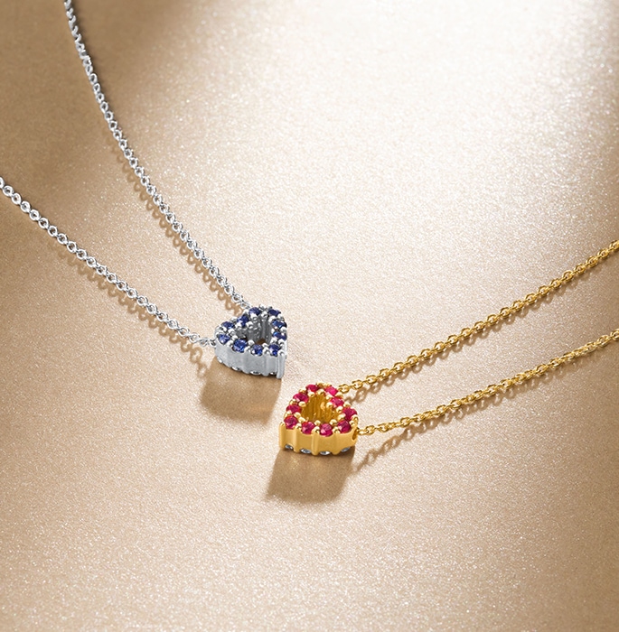 Roberto Coin Tiny Treasures collection - Pair of double sided heart pendants