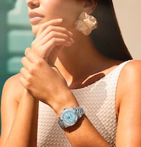 Model wearing ladies Tudor watch. Tap to shop all ladies watches image